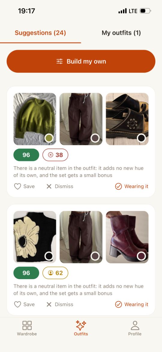 Outfits in Ecru: the “Suggestions (24)” and “My outfits (1)” tabs, a single “Build my own” button, and below them outfit cards scored 96 — each with the reason for that score written under it.